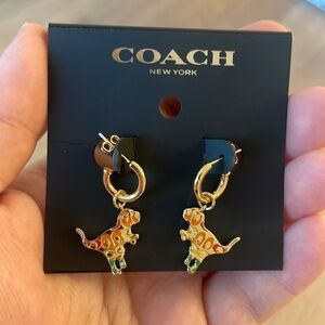 COACH Dinosaur earrings
